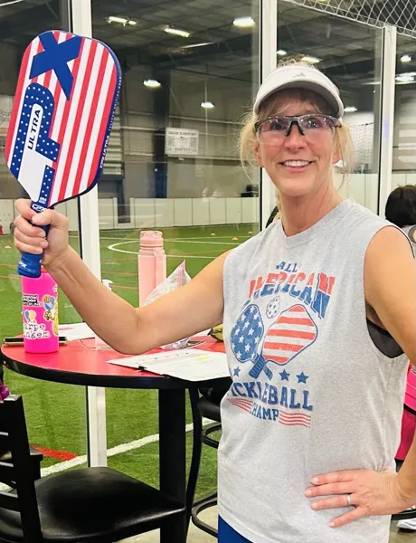 Player with CPX Freedom paddle on court