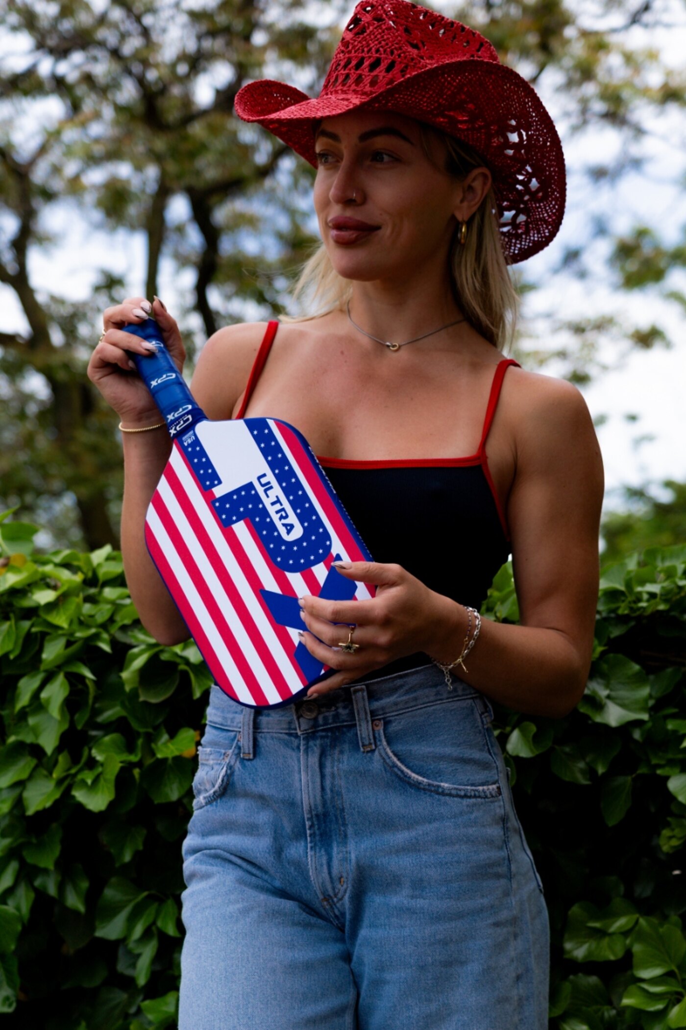 Model with CPX Ultra Freedom paddle outdoors